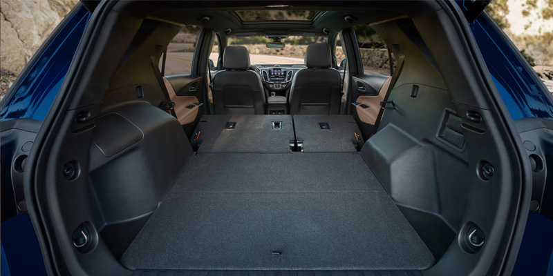 Spacious trunk of the 2023 Chevy Equinox with hidden underfloor storage.